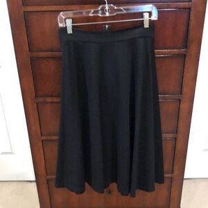 Black midi flared unlined skirt with pockets and back zipper fr BR size 4
